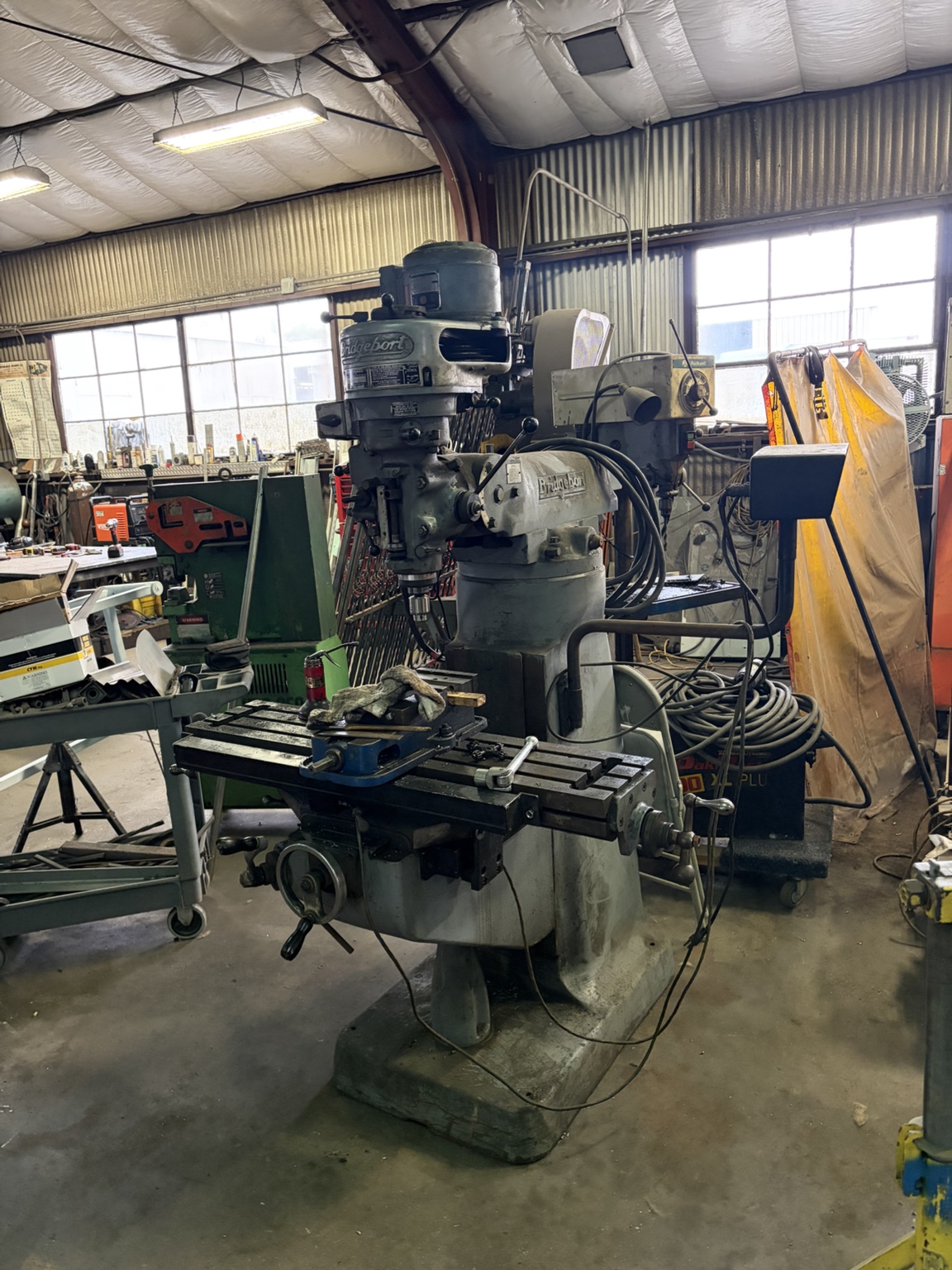 Vertical milling machine in the shop